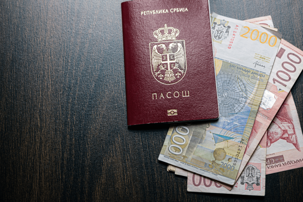 Serbian passport and dinars at the table.
(Is having money and being famous enough for being granted citizenship?)
