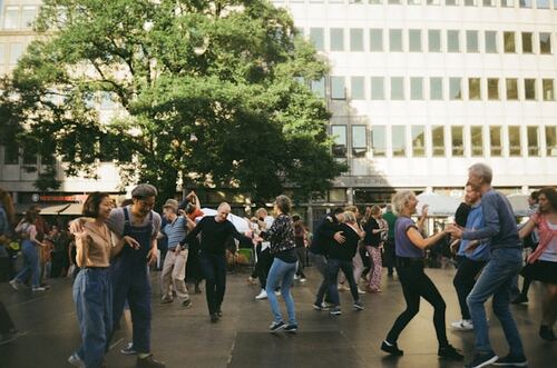 Serbian Kolo: Discover 8 Most Important Things! 2 serbian kolo people dancing on the street