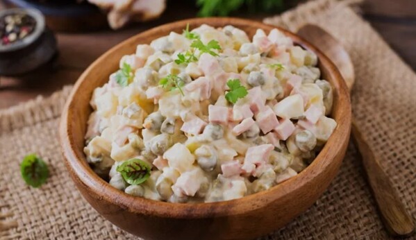 Here Are The 10 Exquisite Serbian Appetizers! 8 serbian appetizers ruska salata creamy salad in a bowl